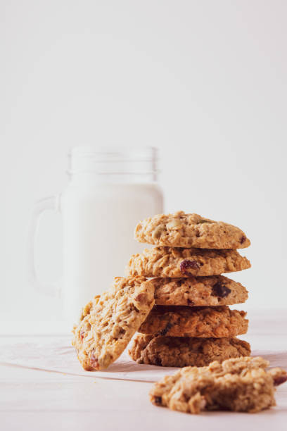 istock oatmeal cookies with milk on a white background 1194923218