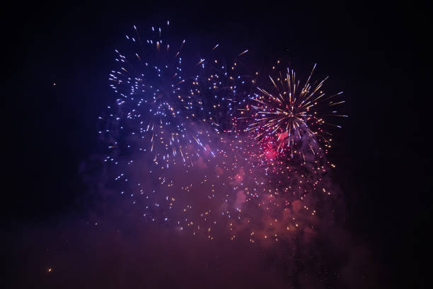 istock Fireworks at New Year. Abstract holiday background. 1194923287