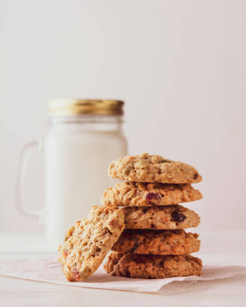istock oatmeal cookies with milk on a white background 1194923937