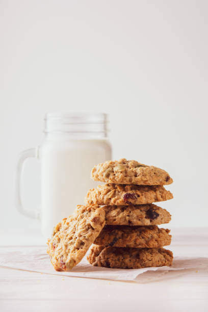 istock oatmeal cookies with milk on a light background 1194924143