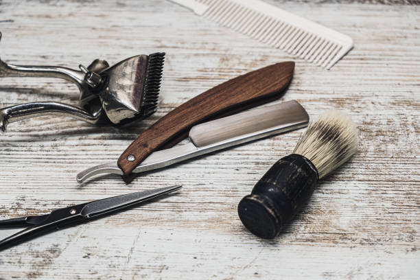 istock vintage barber tools dangerous razor hairdressing scissors old manual clipper comb shaving brush 1194924368