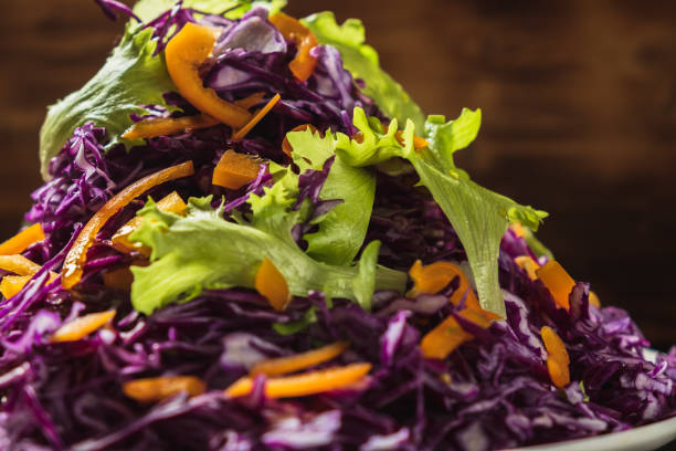 istock head lettuce bell pepper red cabbage salad casually scattered around 1194925274