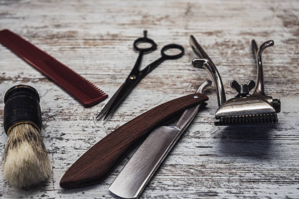 istock vintage barber tools dangerous razor hairdressing scissors old manual clipper comb shaving brush 1194925613
