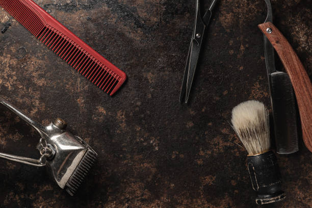istock vintage barber tools dangerous razor hairdressing scissors old manual clipper comb shaving brush. 1194925667