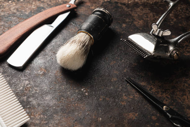 istock vintage barber tools dangerous razor hairdressing scissors old manual clipper comb shaving brush. old rusty metal 1194925992