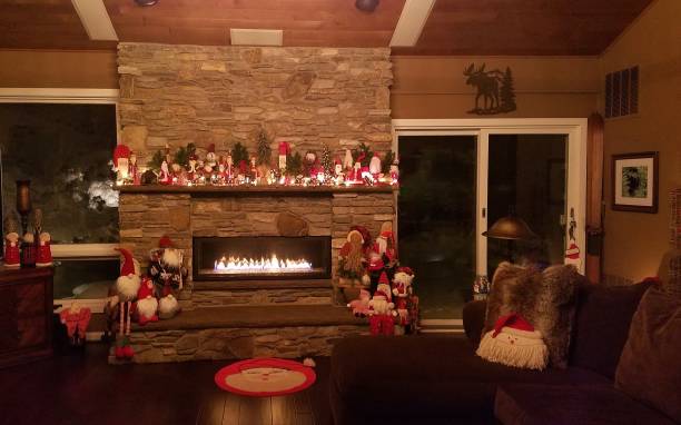 istock Large Stone Masonry Fireplace in a Rustic Mountain Lodge During Christmas Season 1194926534