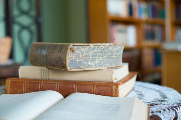 istock Old shabby books in the library 1194927382