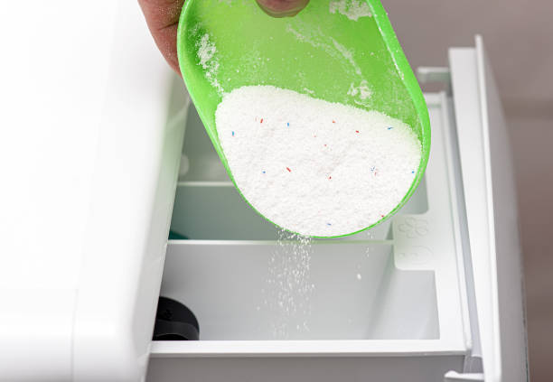 istock Washing Powder and  Washing Machine 1194935246