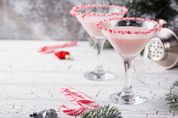 istock Pink peppermint martini with candy cane rim 1194936470