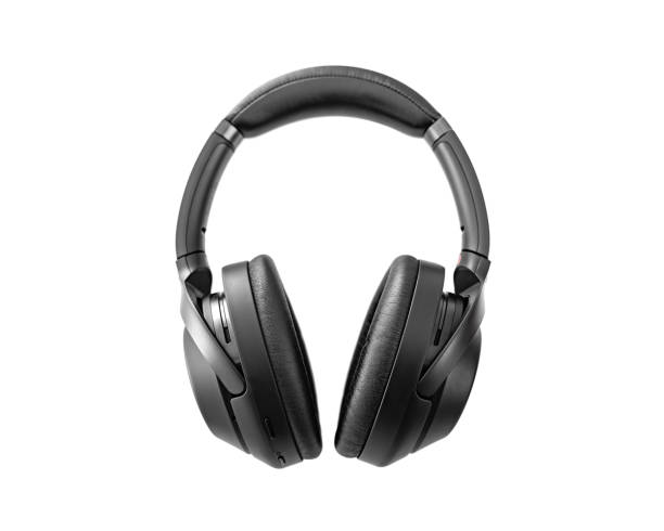 istock Black wireless headphones isolated on white. 1194937658
