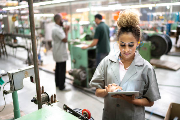 istock Woman using digital tablet in the industry 1194938480