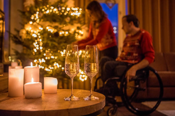 istock Christmas sweaters for disabled couple in xmas home 1194939377