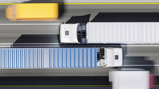 top-ansicht von semi trucks mit blauen und weißen containern in bewegung bei tageslicht - red shipping freight transportation cargo container stock-fotos und bilder