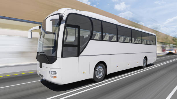 istock White Passenger Bus Moving on the Road in Daylight 1194950764
