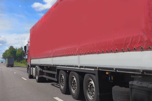 istock truck transports freight 1194954426