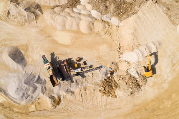 istock Aerial Top View of Quarry with Processing Machinery 1194955162