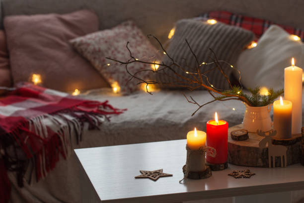 istock Composition of candles on  white table against the background of 1194956279