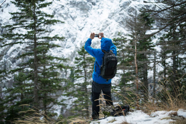 istock Hiker photographic in mountain. 1194956563