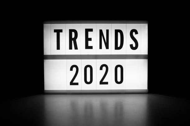 istock Trends 2020 - text on a luminous display in the dark. 1194957349