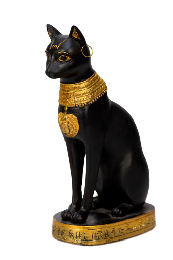 Egyptian cat statue isolated over white