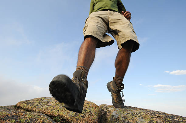 Hikers Legs Stepping Forward stock photo