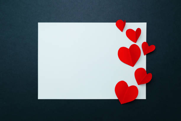 istock Valentine card with red heart on blue paper frame, flat lay, top view 1194970824