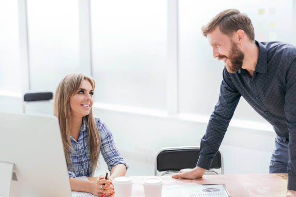 istock business colleagues discussing financial documents in the office. 1194976849