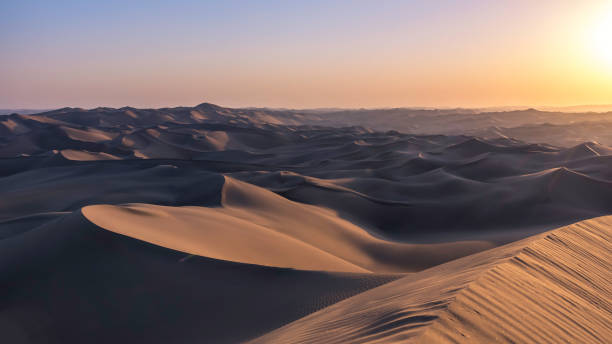 istock colorful sunset in lut desert 1194979140