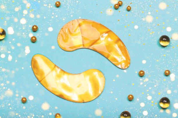 Golden eye patches and vitamin capsules