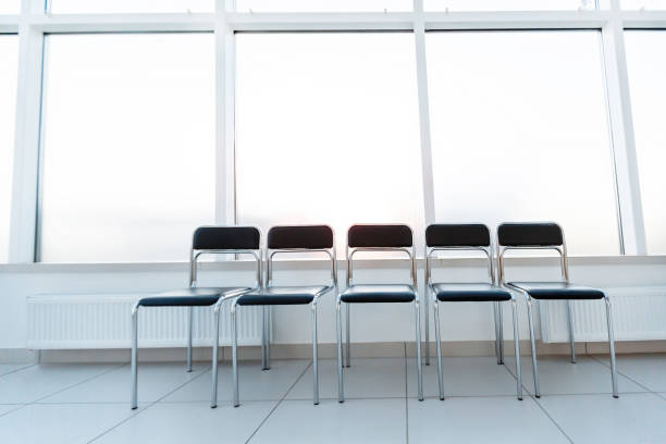 istock row of chairs in the office hallway . 1194981995