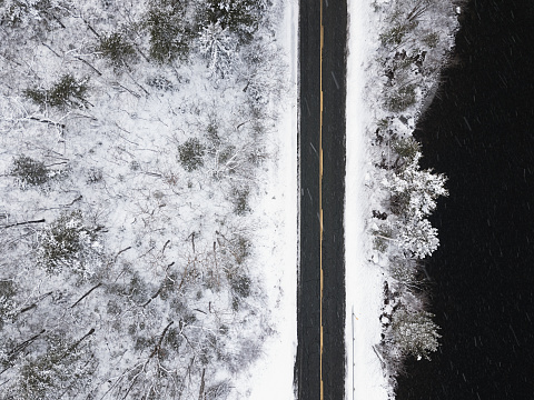 Aerial drone view of a country road in Winter.