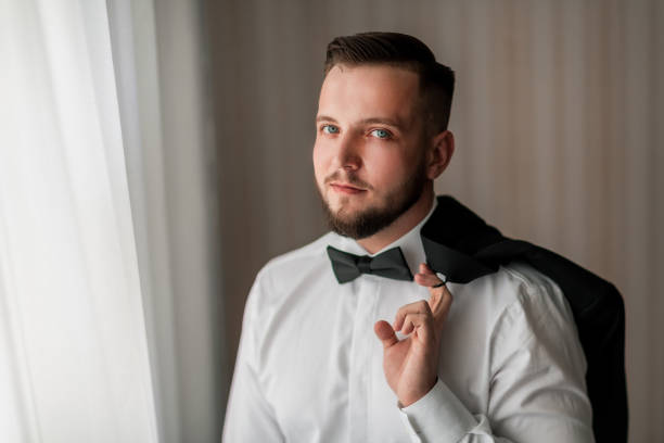 istock portrait of a handsome man with a bow tie 1194986063