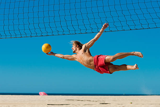 istock Beach volleyball - man jumping 119498617