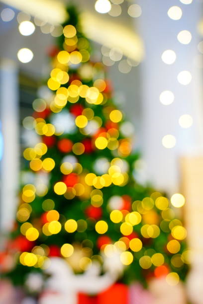 istock Christmas with tree and festive bokeh lighting 1194988860