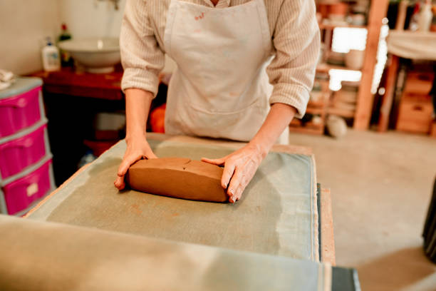 Cropped shot of an unrecognizable artisan working in a pottery workshop