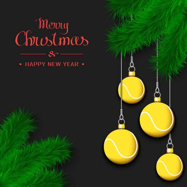 istock Tennis balls on a Christmas tree branch 1194995313
