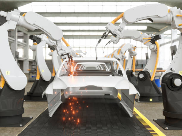 fabbrica di assemblaggio auto - car industry robot arm car plant foto e immagini stock