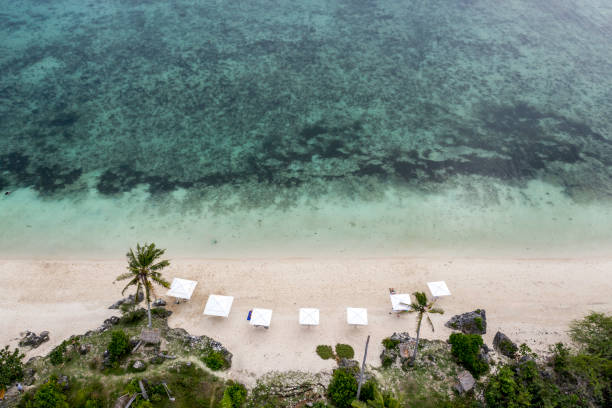 istock Aerial shot Paradise beach (Sandira beach), Bantayan island, North Cebu, Philippines 1195000452