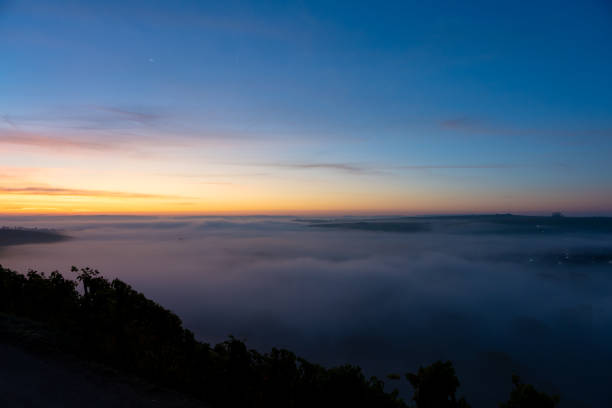 istock Sunrise over the Main river covered with fog 1195001629