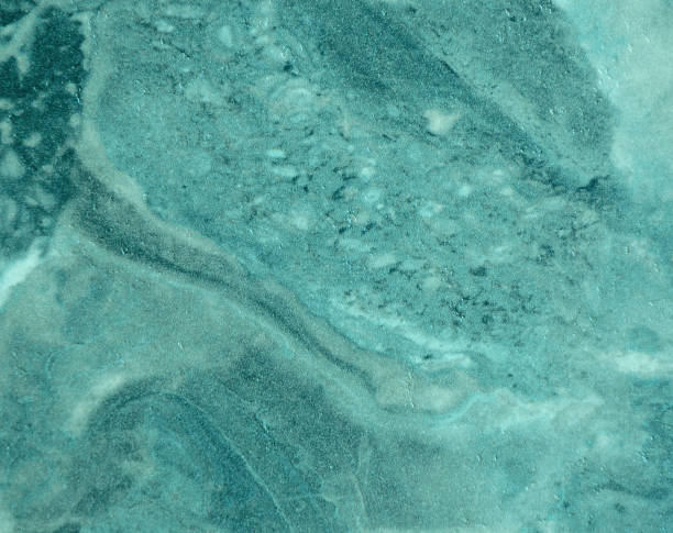 istock Bright green marble, natural stone texture on a polished surface. 1195003949