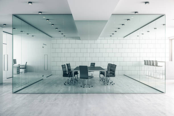 istock Meeting room with conference table and chairs in a modern sunny office interior. Teamwork concept. 3D Rendering 1195003959