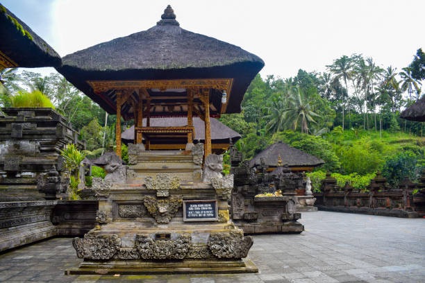 istock Old Hindu temple inside view with old architecture structures in Bali Indonesia 1195005350