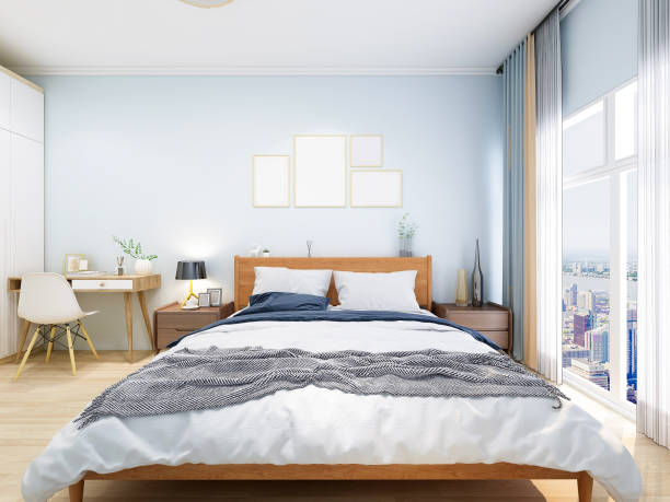 istock Elegant bedroom with a customized wardrobe, desks and chairs 1195006157