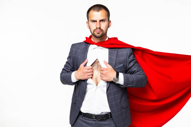 istock Superhero businessman with red coat isolated on white background 1195006597