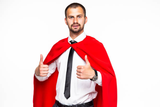 istock Businessman dressed like superhero with thumb up Isolated on white background 1195008832