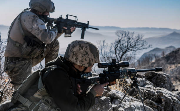 istock Army Soldier soldiers clash with terrorists 1195008854