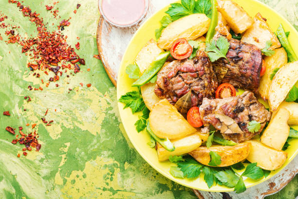istock Grilled meat and potatoes 1195013225