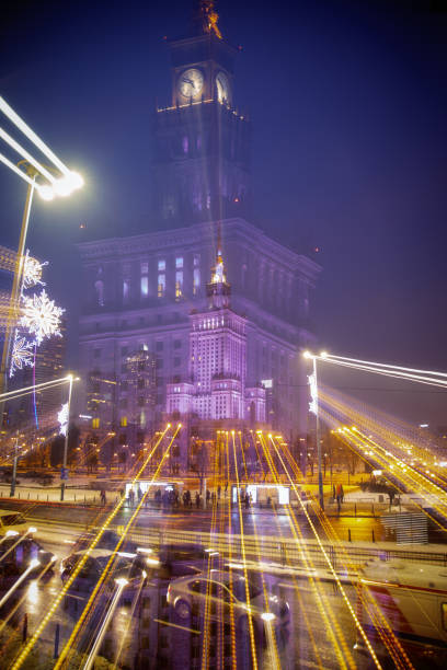 Warsaw Palace of Culture and Science Warsaw Palace of Culture and Science by night city zoom out stock pictures, royalty-free photos & images
