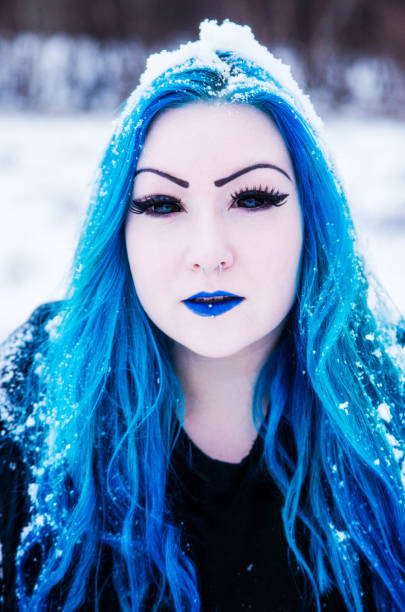 istock Young woman with blue hair 1195013700