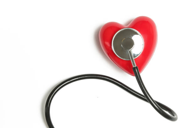 istock Red heart and a stethoscope isolated on white background 1195014368